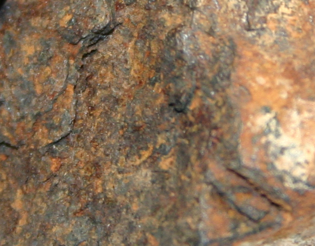 the surface is "coated" by a layer of rust